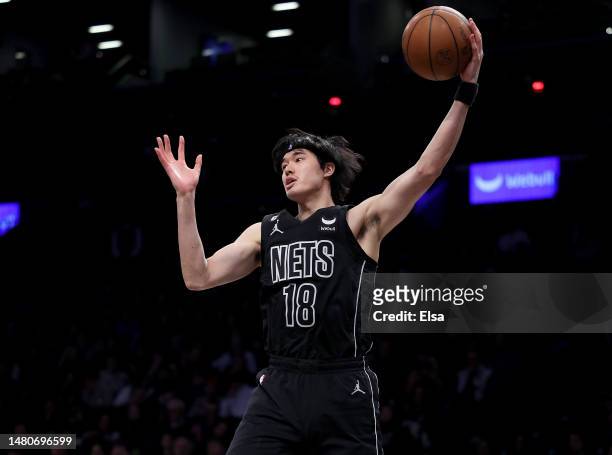 Yuta Watanabe of the Brooklyn Nets grabs the rebound in the fourth quarter against the Orlando Magic at Barclays Center on April 07, 2023 in the...