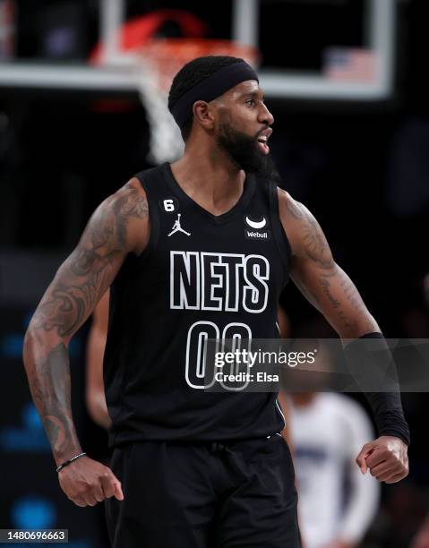 Royce O'Neale of the Brooklyn Nets celebrates in the second half against the Orlando Magic at Barclays Center on April 07, 2023 in the Brooklyn...