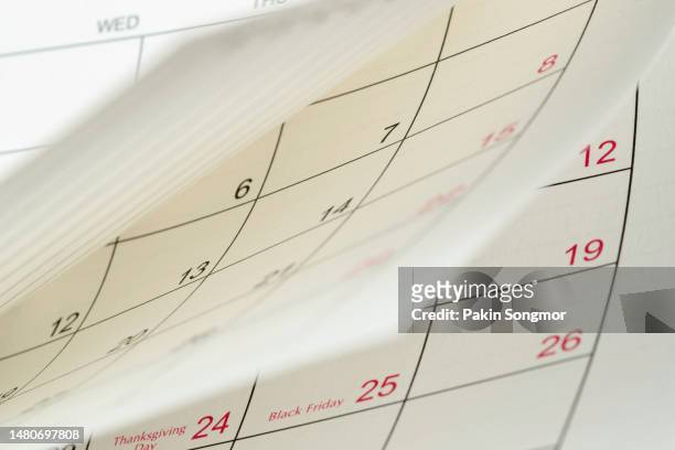 close-up white paper desk calendar appointment and business meeting concept. - calendario foto e immagini stock