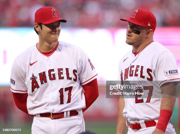 Shohei Ohtani and Mike Trout of the Los Angeles Angels line up for the National Anthem before the game against the Toronto Blue Jays during the 2023...