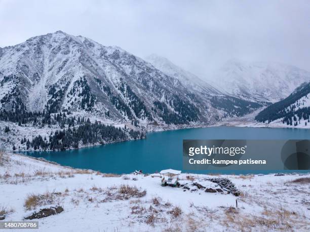 big almaty lake is a highland reservoir and natural landmark in almaty, kazakhstan. - almaty stock-fotos und bilder