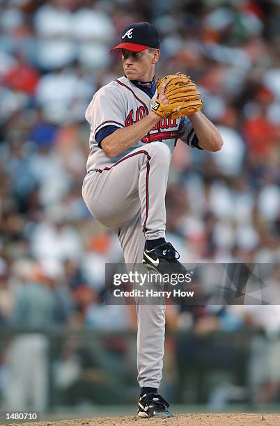 Tom Glavine of the Atlanta Braves prepares to pitch the ball during game three of the National League Western Division Series against the San...