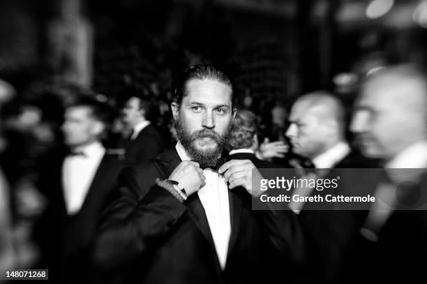 Actor Tom Hardy departs the 'Lawless' Premiere during the 65th Annual Cannes Film Festival at Palais des Festivals on May 19, 2012 in Cannes, France.