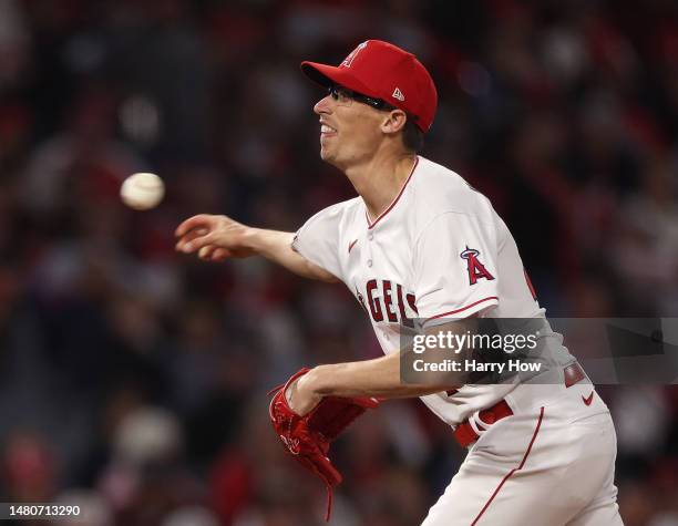 Jimmy Herget of the Los Angeles Angels pitches against the Toronto Blue Jays during the seventh inning in the 2023 home opener at Angel Stadium of...