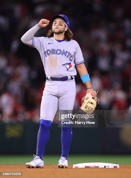 Bo Bichette of the Toronto Blue Jays reacts to the final out of the ninth inning in a 4-3 win over the Los Angeles Angels during the 2023 home opener...