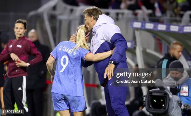 Coach of France Herve Renard congratulates Eugenie Le Sommer of France after scoring a goal during the international women's friendly match between...