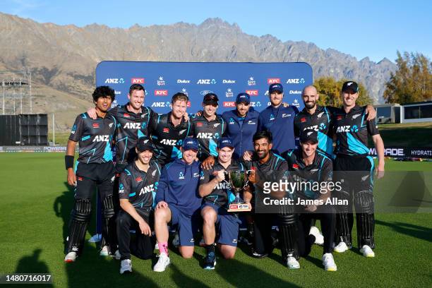 The Black Caps pose with the series winners trophy during game three of the T20 International Series between New Zealand and Sri Lanka at John Davies...