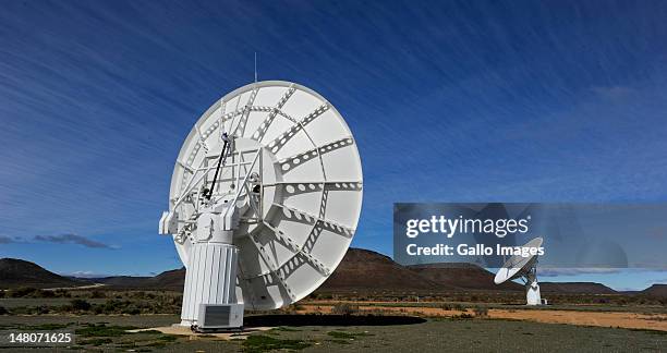 South Africa's KAT-7 telescope, a seven-dish array which is a precursor to the much larger Square Kilometre Array near Carnarvon on July 4, 2012 in...