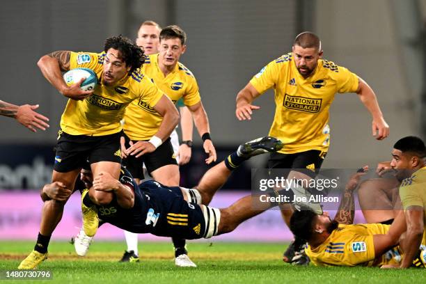 Billy Proctor of the Hurricanes charges forward during the round seven Super Rugby Pacific match between Highlanders and Hurricanes at Forsyth Barr...