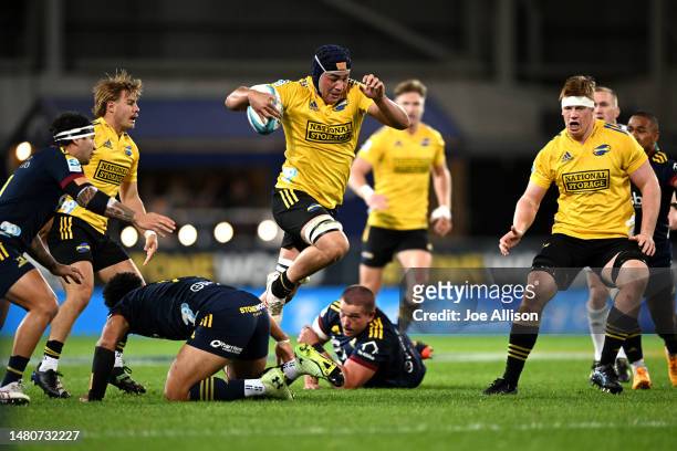 Brayden Iose of the Hurricanes makes a break during the round seven Super Rugby Pacific match between Highlanders and Hurricanes at Forsyth Barr...