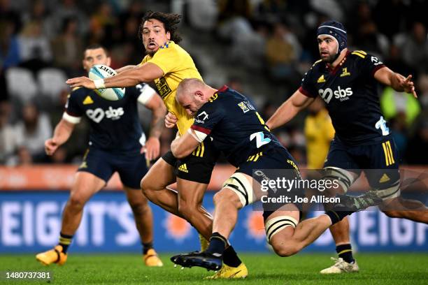 Billy Proctor of the Hurricanes makes a break during the round seven Super Rugby Pacific match between Highlanders and Hurricanes at Forsyth Barr...