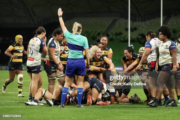 Western Force celebrate scoring a try during the Super W match between Melbourne Rebels Women and Western Force at AAMI Park, on April 08 in...