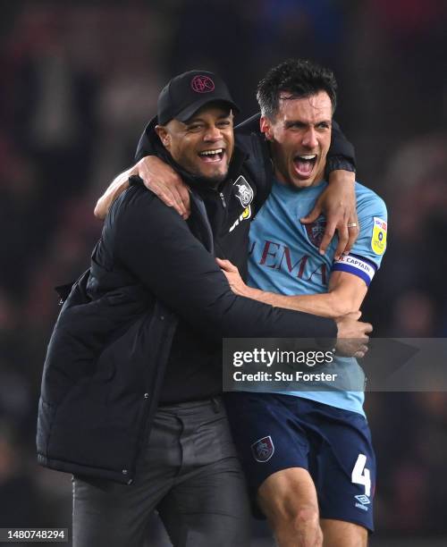 Burnley Manager Vincent Kompany celebrates with Jack Cork after Burnley had sealed promotion after the Sky Bet Championship between Middlesbrough and...