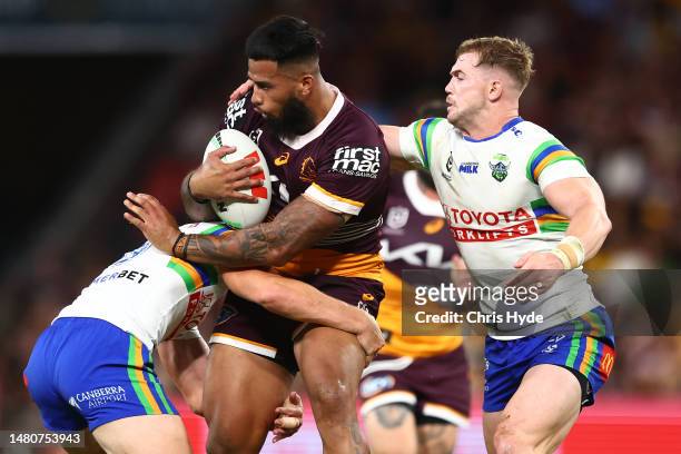 Payne Haas of the Broncos is tackled during the round six NRL match between Brisbane Broncos and Canberra Raiders at Suncorp Stadium on April 08,...