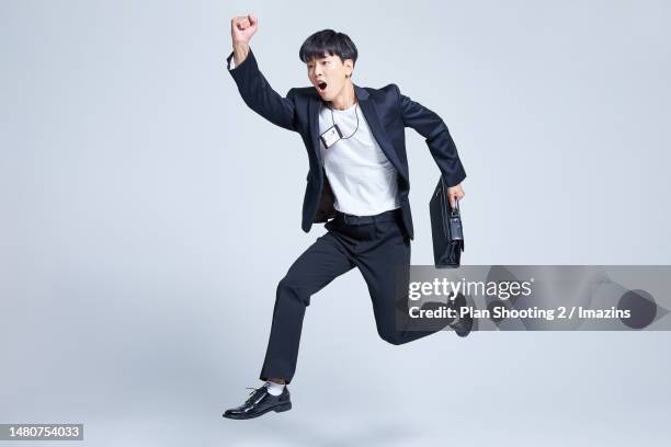 mz generation, 20s, youth, z generation, new employee, business man, white color, personality, jumping - buisnessman studio clipping path bildbanksfoton och bilder