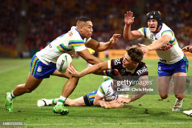 Reece Walsh of the Broncos passes during the round six NRL match between Brisbane Broncos and Canberra Raiders at Suncorp Stadium on April 08, 2023...