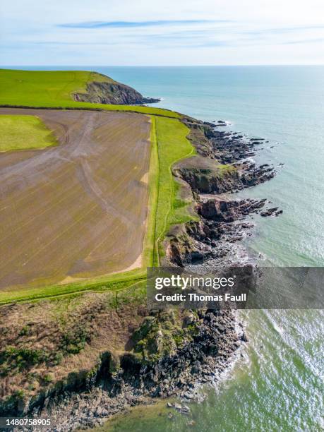 rocky coastline at red cove in devon - south west coast path stock pictures, royalty-free photos & images