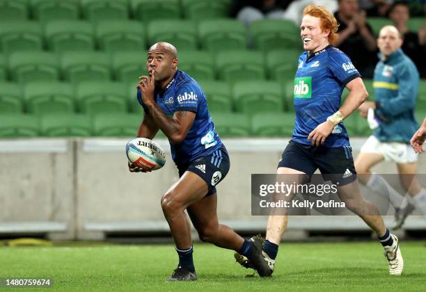 Mark Telea of the Blues celebrates scoring a try during the round seven Super Rugby Pacific match between Melbourne Rebels and Blues at AAMI Park, on...