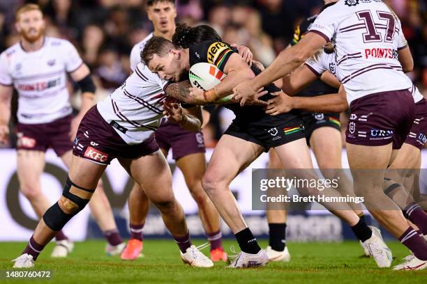 Dylan Edwards of the Panthers is tackled during the round six NRL match between Penrith Panthers and Manly Sea Eagles at BlueBet Stadium on April 08,...