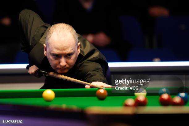 Graeme Dott of Scotland plays a shot in the third round match against Andy Hicks of England on day 6 of the Cazoo World Championship 2023 Qualifiers...