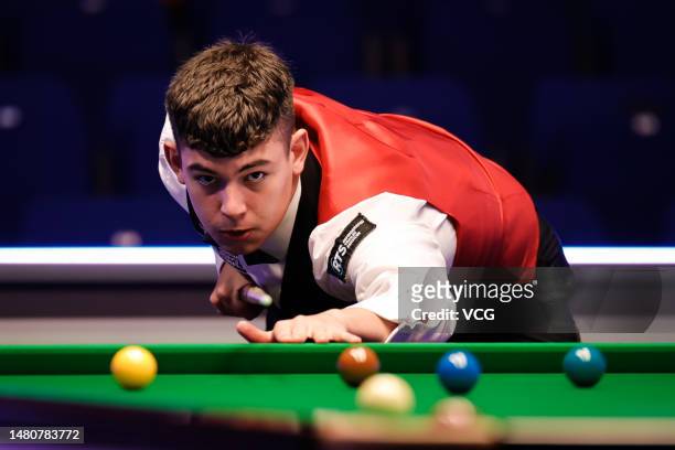 Liam Davies of Wales plays a shot in the second round match against Scott Donaldson of Scotland on day 5 of the Cazoo World Championship 2023...