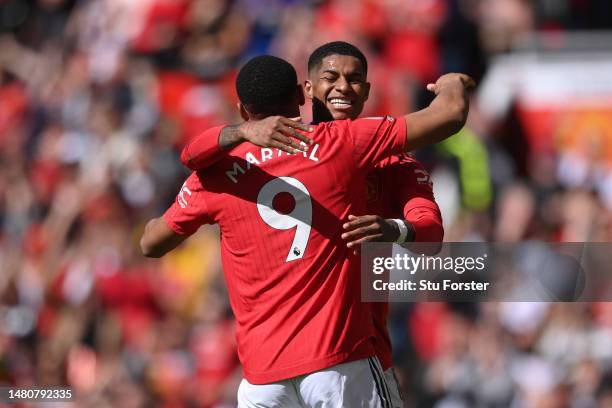 Anthony Martial of Manchester United celebrates with teammate Marcus Rashford after scoring the team's second goal during the Premier League match...