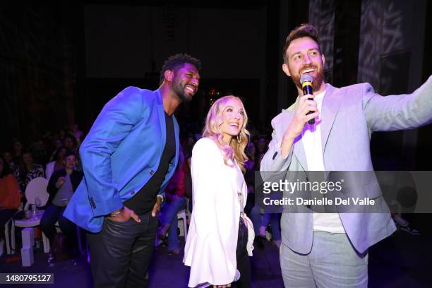 Brett Brown, Chelsea Griffin and Cameron Hamilton pose onstage during a Q&A as Love Is Blind Cast celebrates Netflix's first Live Reunion with the...