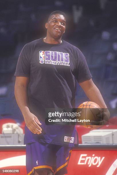 Oliver Miller of the Phoenix Suns looks on before basketball game against the Washington Bullets at Capital Centre on January 22, 1993 in Landover,...