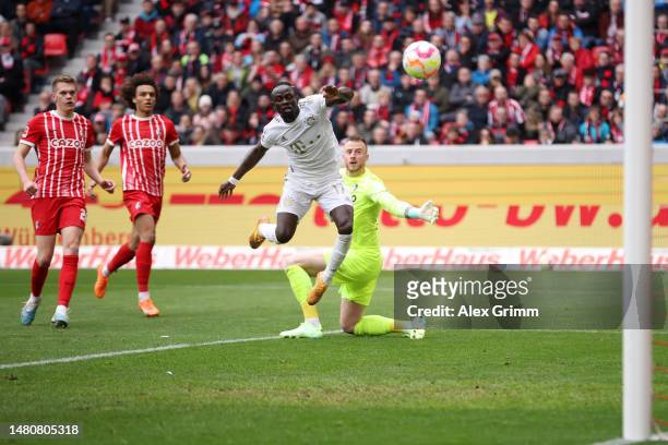 Sadio Mane of Bayern Munich scores their sides first goal which is later disallowed during the Bundesliga match between Sport-Club Freiburg and FC...
