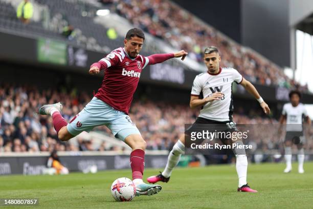 Pablo Fornals of West Ham United is challenged by Andreas Pereira of Fulham during the Premier League match between Fulham FC and West Ham United at...