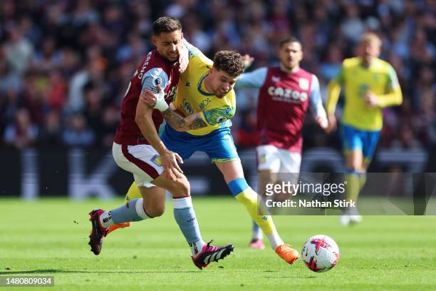Alex Moreno of Aston Villa battles for possession with Neco Williams of Nottingham Forest during the Premier League match between Aston Villa and...