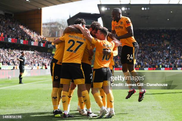 Matheus Nunes of Wolverhampton Wanderers celebrates after scoring his side's first goal during the Premier League match between Wolverhampton...