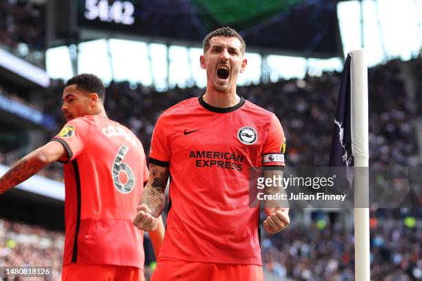 Lewis Dunk of Brighton & Hove Albion celebrates a goal which was later disallowed by VARduring the Premier League match between Tottenham Hotspur and...
