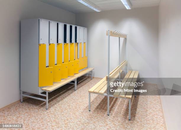 a changing room or locker room in a school or technical college. interior - high school locker room stock pictures, royalty-free photos & images