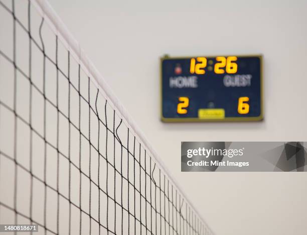 a school sports hall, the electronic scoreboard - electronic scoreboard stock pictures, royalty-free photos & images