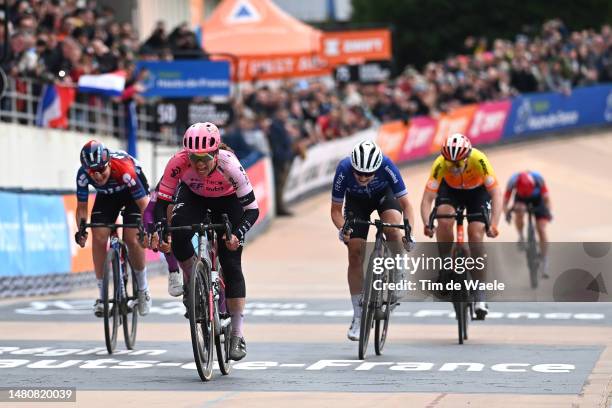 Alison Jackson of Canada and Team EF Education-Tibco-Svb celebrates at finish line as race winner ahead of Katia Ragusa of Italy and Team Liv Racing...