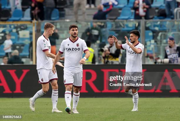 Nicola Sansone of Bologna FC celebrates with teammates after scoring the team's first goal during the Serie A match between Atalanta BC and Bologna...