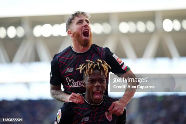 Nico Williams of Athletic Club celebrates with teammate Iker Muniain after scoring the team's second goal during the LaLiga Santander match between...