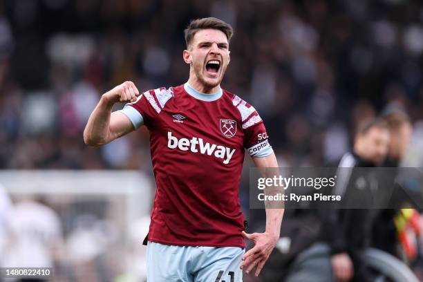 Declan Rice of West Ham United celebrates after the team's victory during the Premier League match between Fulham FC and West Ham United at Craven...