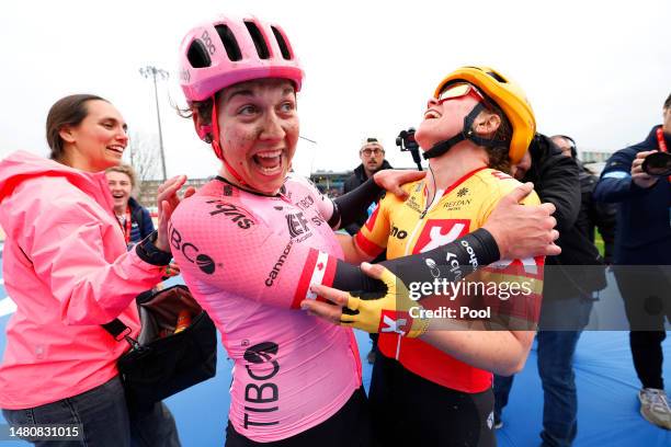 Race winner Alison Jackson of Canada and Team EF Education-Tibco-Svb and Susanne Andersen of Norway and Uno-X Pro Cycling Team react after the 3rd...