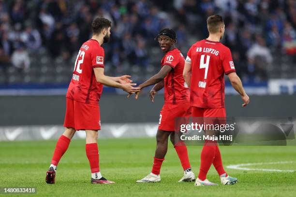 Amadou Haidara of RB Leipzig celebrates after Mohamed Simakan of RB Leipzig scores their sides first goal match between Hertha BSC and RB Leipzig at...