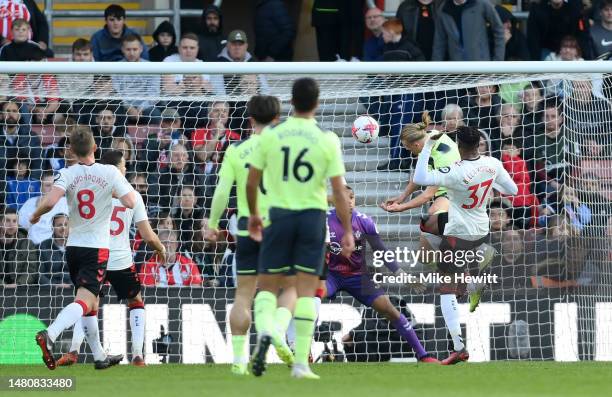 Erling Haaland of Manchester City scores the team's first goal during the Premier League match between Southampton FC and Manchester City at Friends...