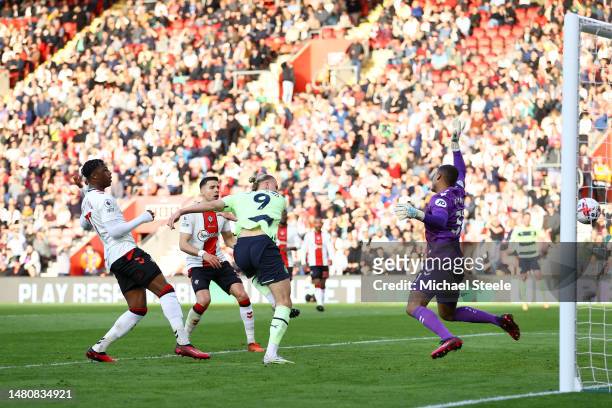Erling Haaland of Manchester City scores the team's first goal past Gavin Bazunu of Southampton during the Premier League match between Southampton...