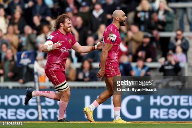 Olly Woodburn of Exeter Chiefs celebrates scoring the team's third try with teammate Jannes Kirsten during the Heineken Champions Cup Quarter Finals...