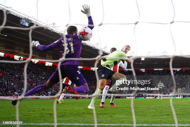 Erling Haaland of Manchester City scores the team's first goal past Gavin Bazunu of Southampton during the Premier League match between Southampton...