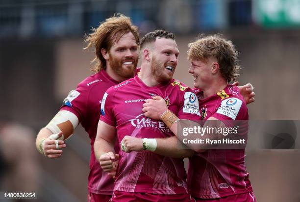 Sam Simmonds of Exeter Chiefs celebrates scoring the team's fourth try with teammates Jannes Kirsten and Will Becconsall during the Heineken...