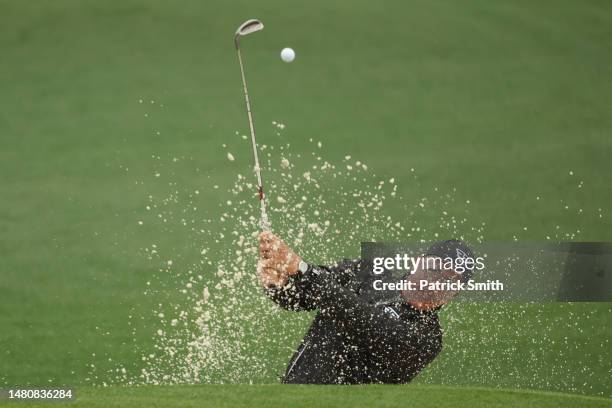Phil Mickelson of the United States plays a shot from a bunker on the second hole during the third round of the 2023 Masters Tournament at Augusta...