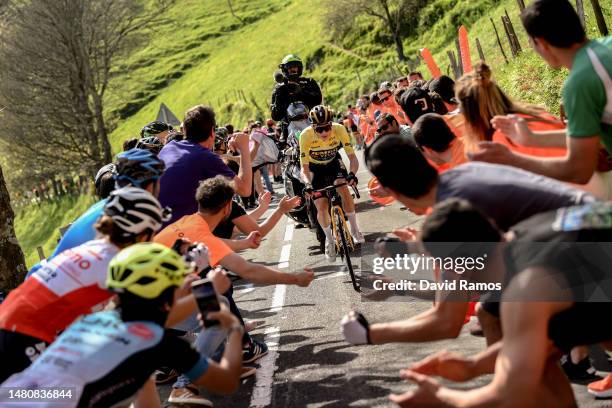 Jonas Vingegaard of Denmark and Team Jumbo – Visma - Yellow Leader Jersey competes in the breakaway while fans cheers during the 62nd Itzulia Basque...