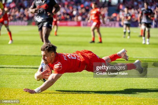 Arthur Retière of Toulouse scores during the Heineken Champions Cup match between Toulouse and Sharks at Stade Ernest Wallon on April 08, 2023 in...