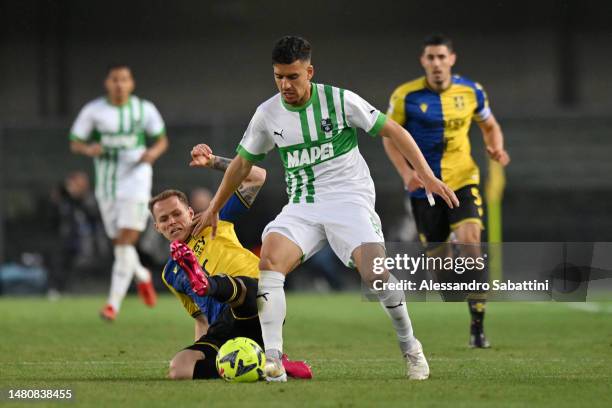 Ondrej Duda of Hellas Verona clashes with Abdou Harroui of US Sassuolo during the Serie A match between Hellas Verona and US Sassuolo at Stadio...